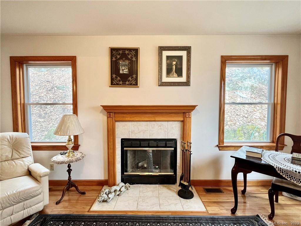 Fireplace & large windows. 7 Cora Lane, Wilton CT For Sale