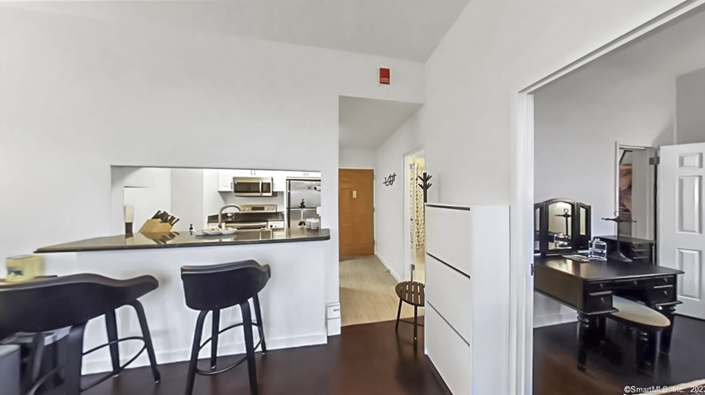 Entrance Hallway Kitchen and Bedroom views