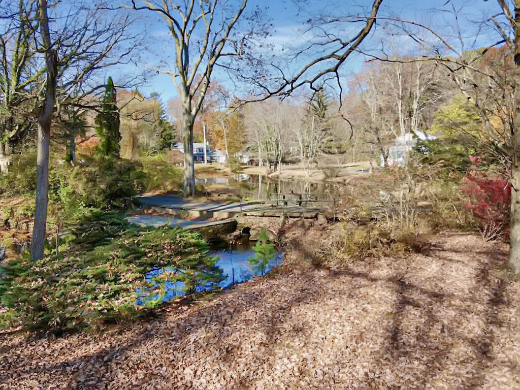 1 Meeting Grove Lane, Norwalk, CT with a natural swimming hole running through your backyard, the 5 Mile River.