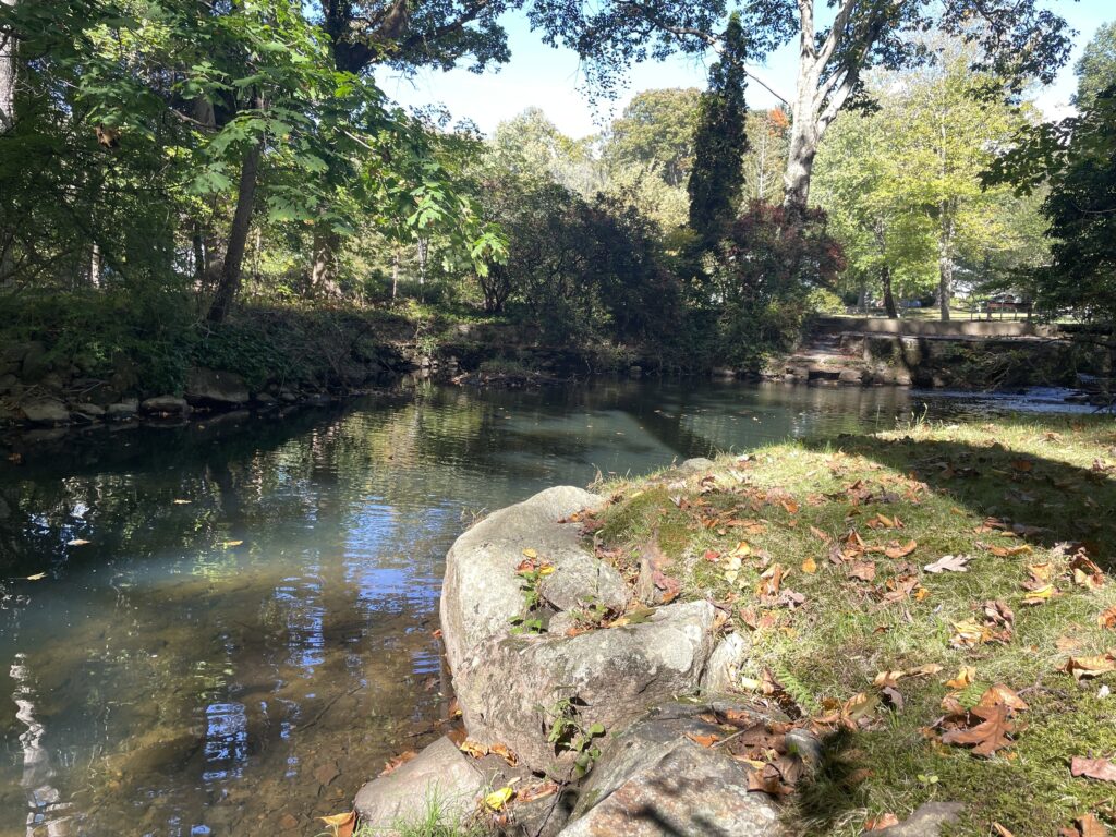 1 Meeting Grove Lane, Norwalk, CT with a natural swimming hole running through your backyard, the 5 Mile River.