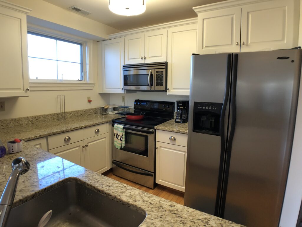 Kitchen with Stainless Steel Applicance Granite Counter Tops