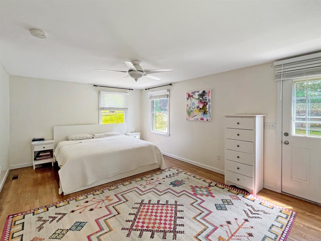 Bedroom 1 of 2 - Freshly painted, new windows and hardwood floors